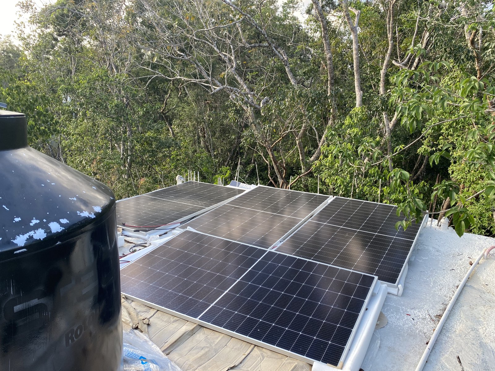 Completed solar panel array installed on a rooftop in Tulum